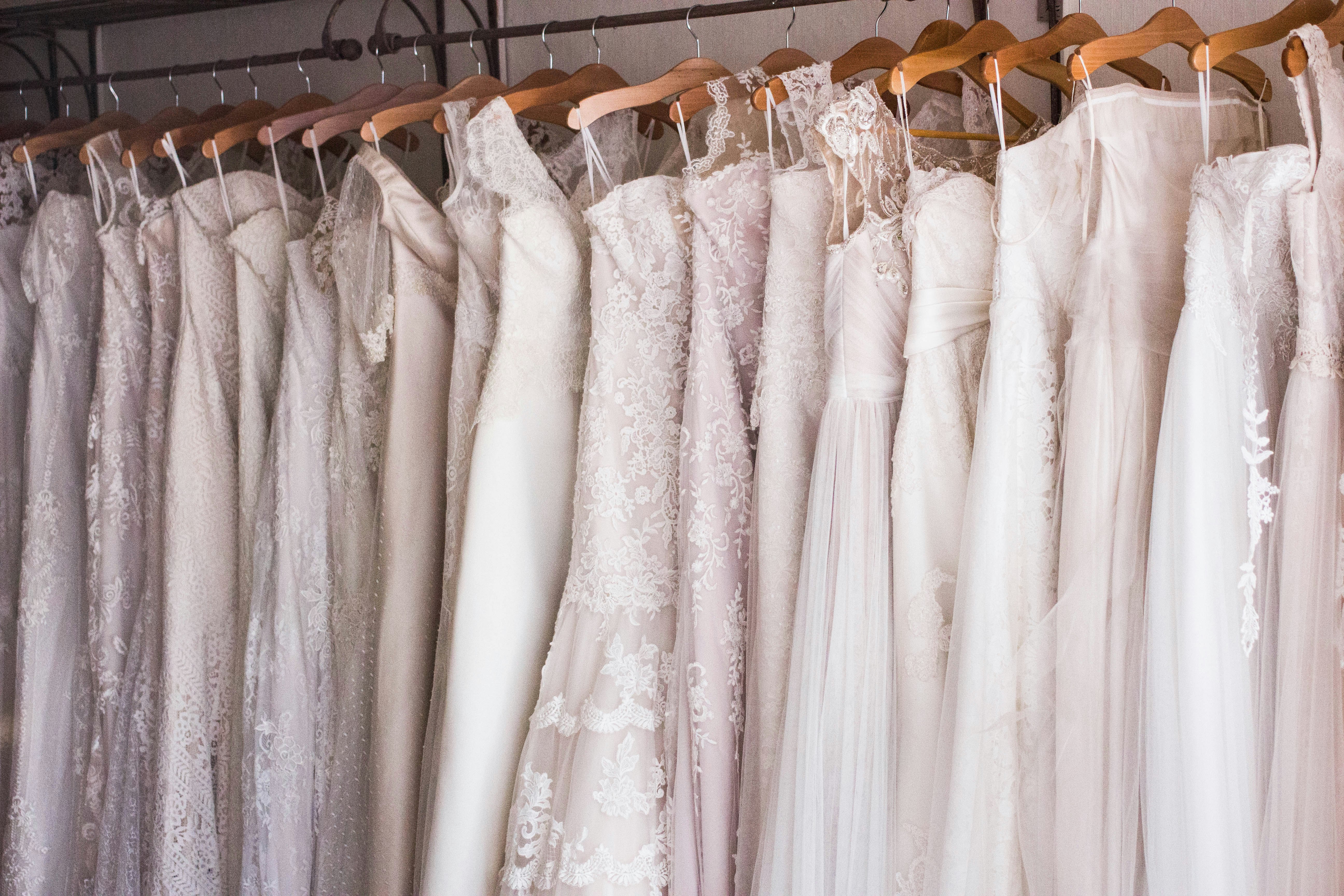 women's white dress on hangers